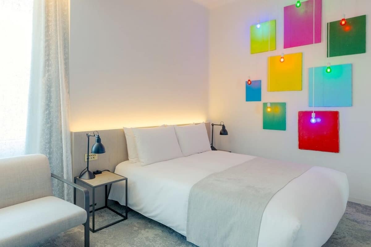 Premium bedding, down comforters, free minibar, in-room safe