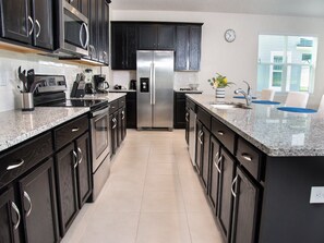 Fridge, microwave, coffee/tea maker, toaster