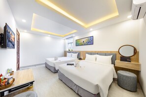 Quarto triplo standard | Frigobar, escrivaninha, cortinas blackout, quartos à prova de som