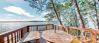 Lakefront home with dock, swimming area, & wood stove - sunset views