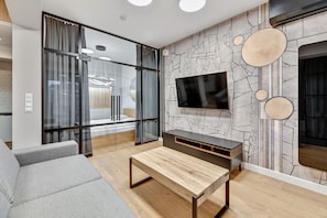 Premium Apartment | Living room | 46-inch flat-screen TV with digital channels, TV