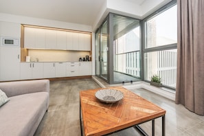 Superior Apartment | Living area | 46-inch flat-screen TV with digital channels, TV