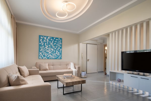 Apartment, 2 Bedrooms | Living area | Flat-screen TV