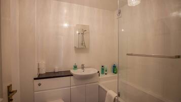 Shower, hair dryer, towels