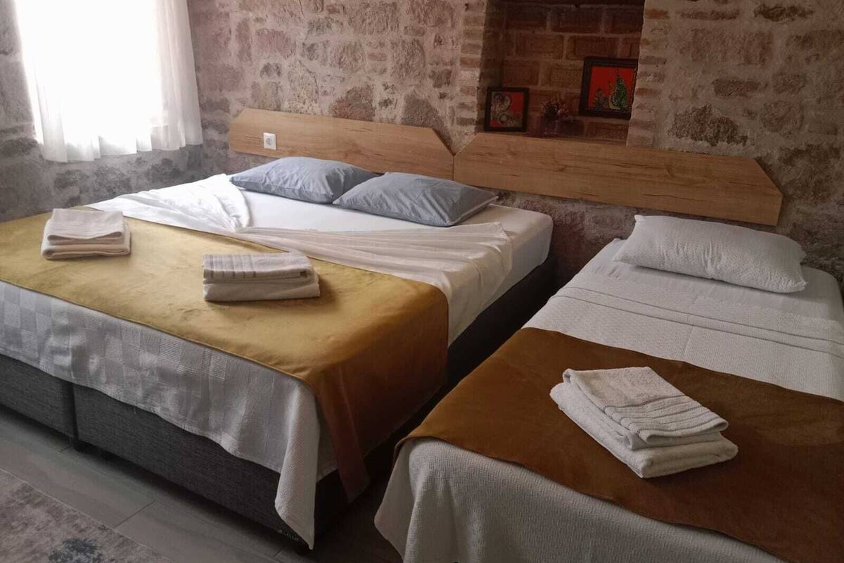 Premium bedding, desk, laptop workspace, free WiFi