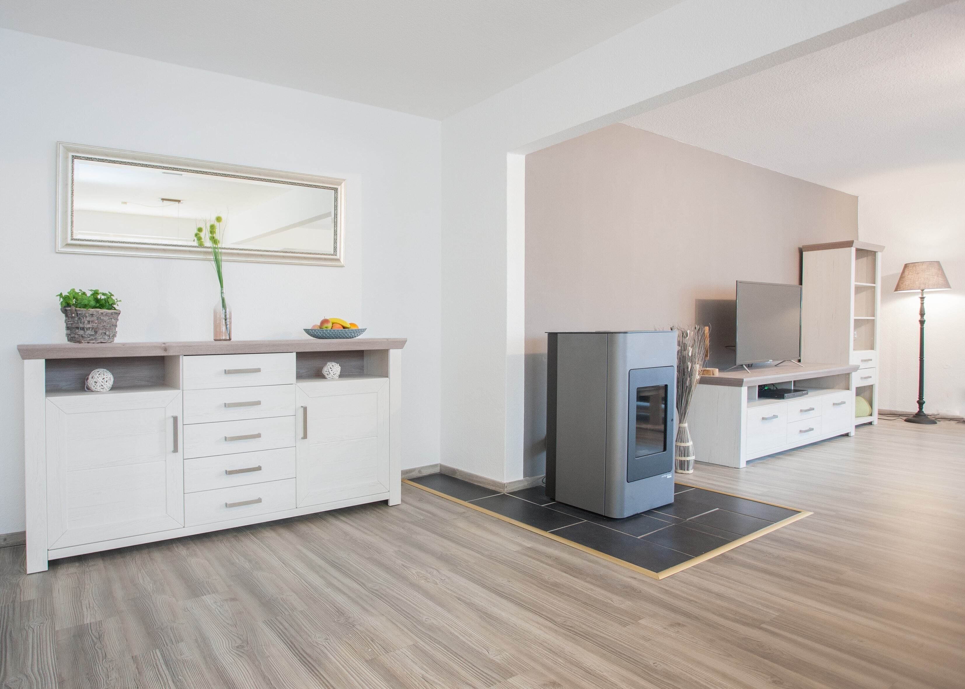 Apartment | Living area | 25-inch LED TV with cable channels, DVD player