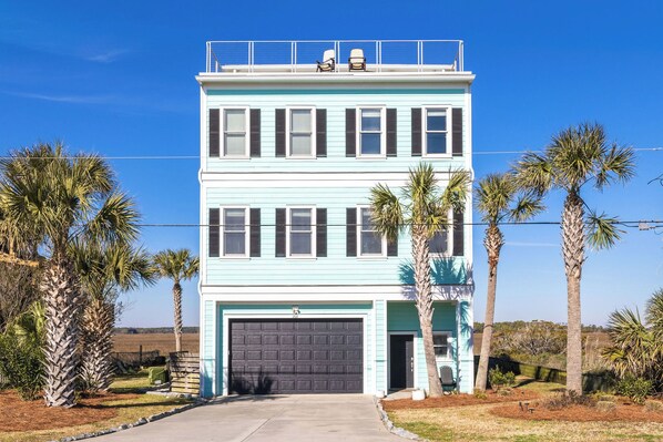 Welcome to iSea360, a stunning vacation home on Folly Beach offering panoramic views of the ocean and marsh