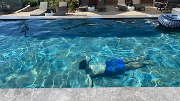 Outdoor pool, free pool cabanas, pool umbrellas