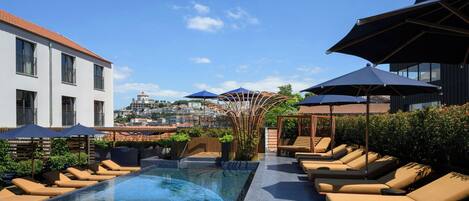 Outdoor pool, open 10:00 AM to 9:00 PM, sun loungers