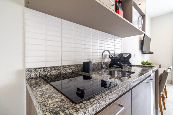 Fridge, microwave, coffee/tea maker, toaster