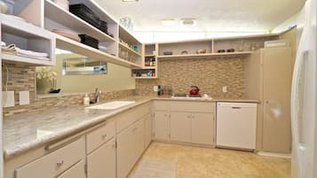 Condo, Multiple Beds (Casa Aralia) | Private kitchen | High chair