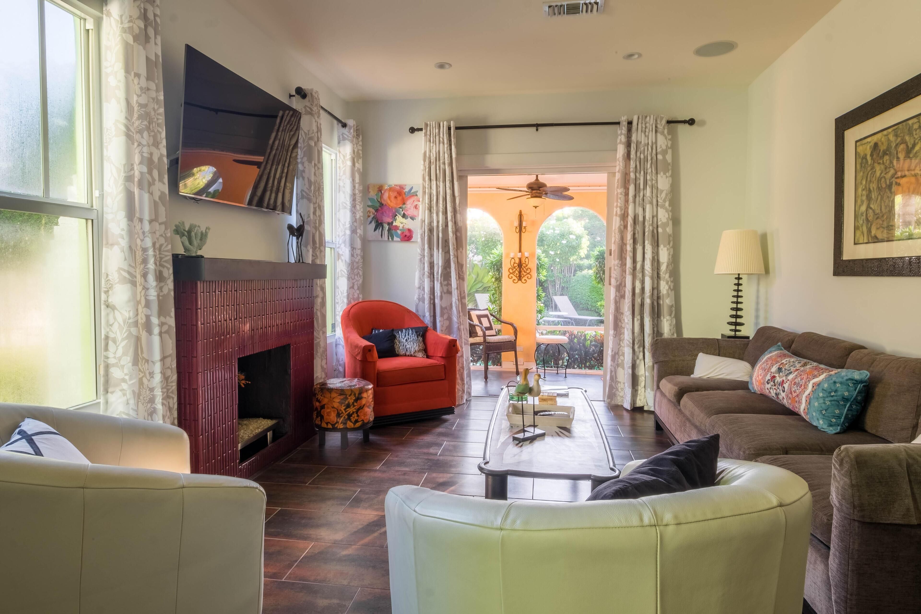House, Multiple Beds (Amara House) | Living room | TV, fireplace