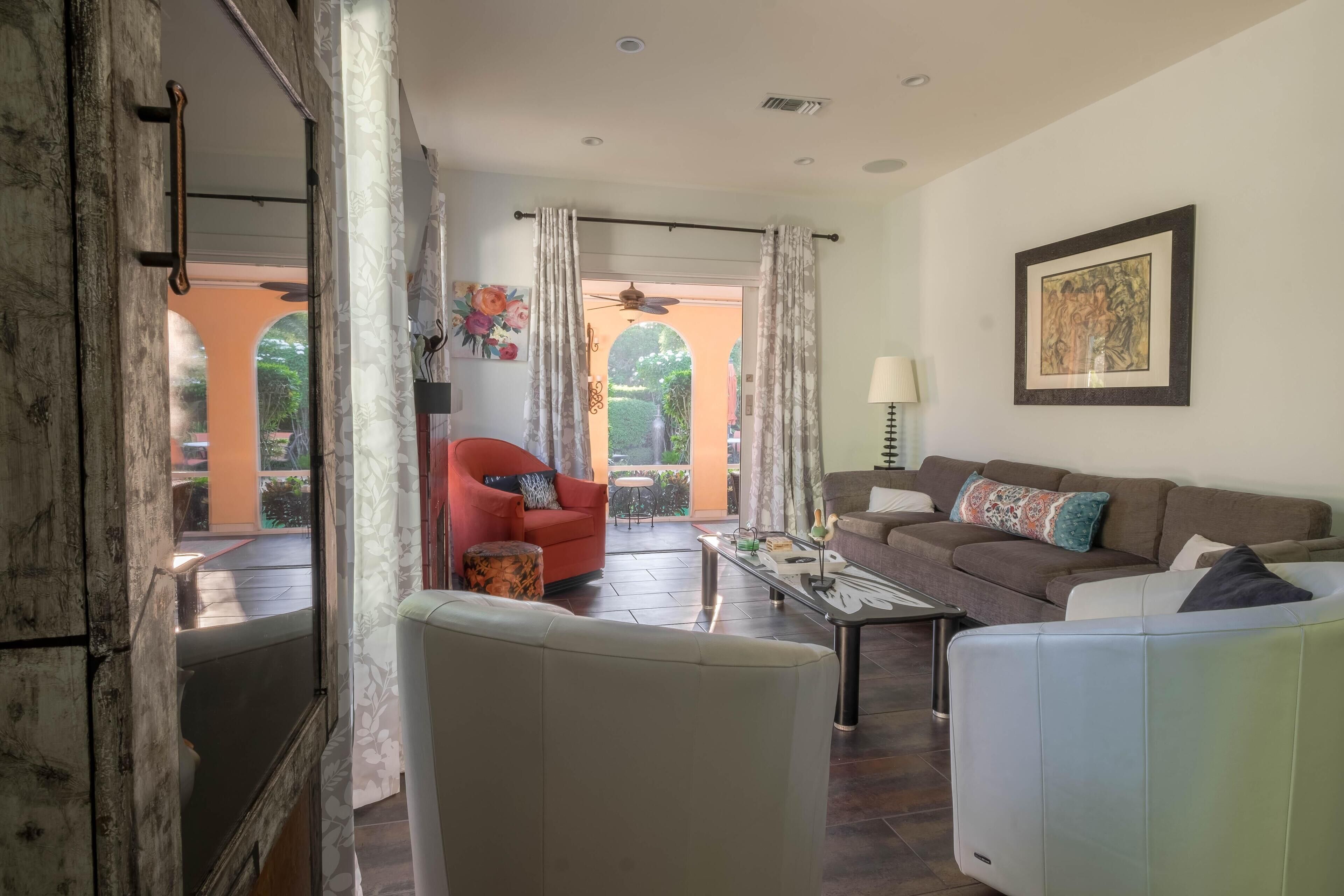 House, Multiple Beds (Amara House) | Living room | TV, fireplace