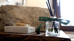 Shower, hydromassage showerhead, eco-friendly toiletries, hair dryer