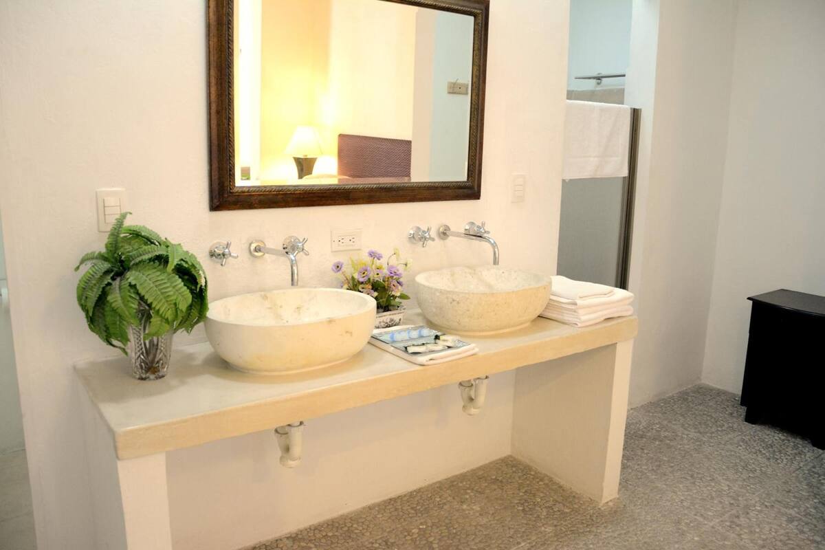 shower, rainfall showerhead, hair dryer, towels