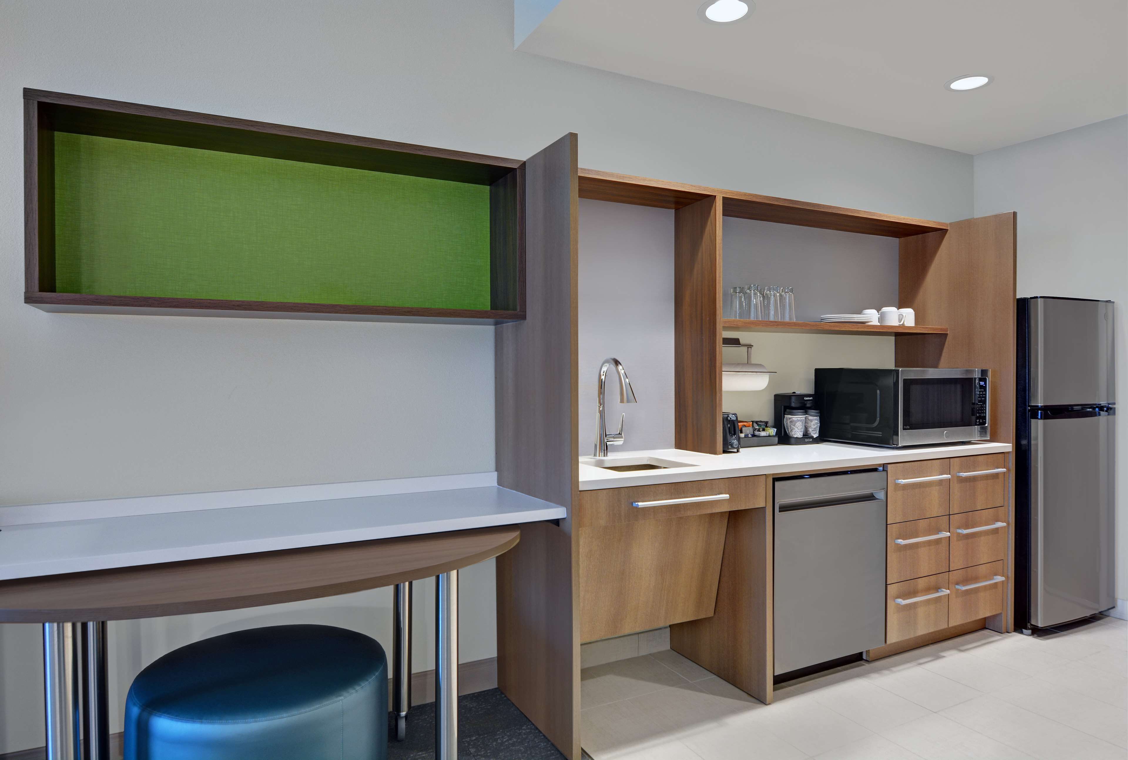 full-sized fridge, microwave, dishwasher, coffee/tea maker