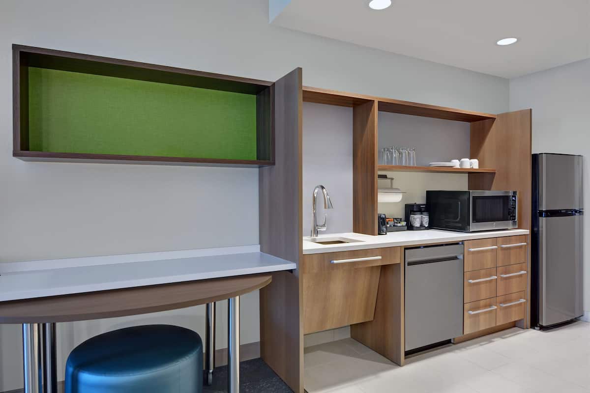 full-sized fridge, microwave, dishwasher, coffee/tea maker