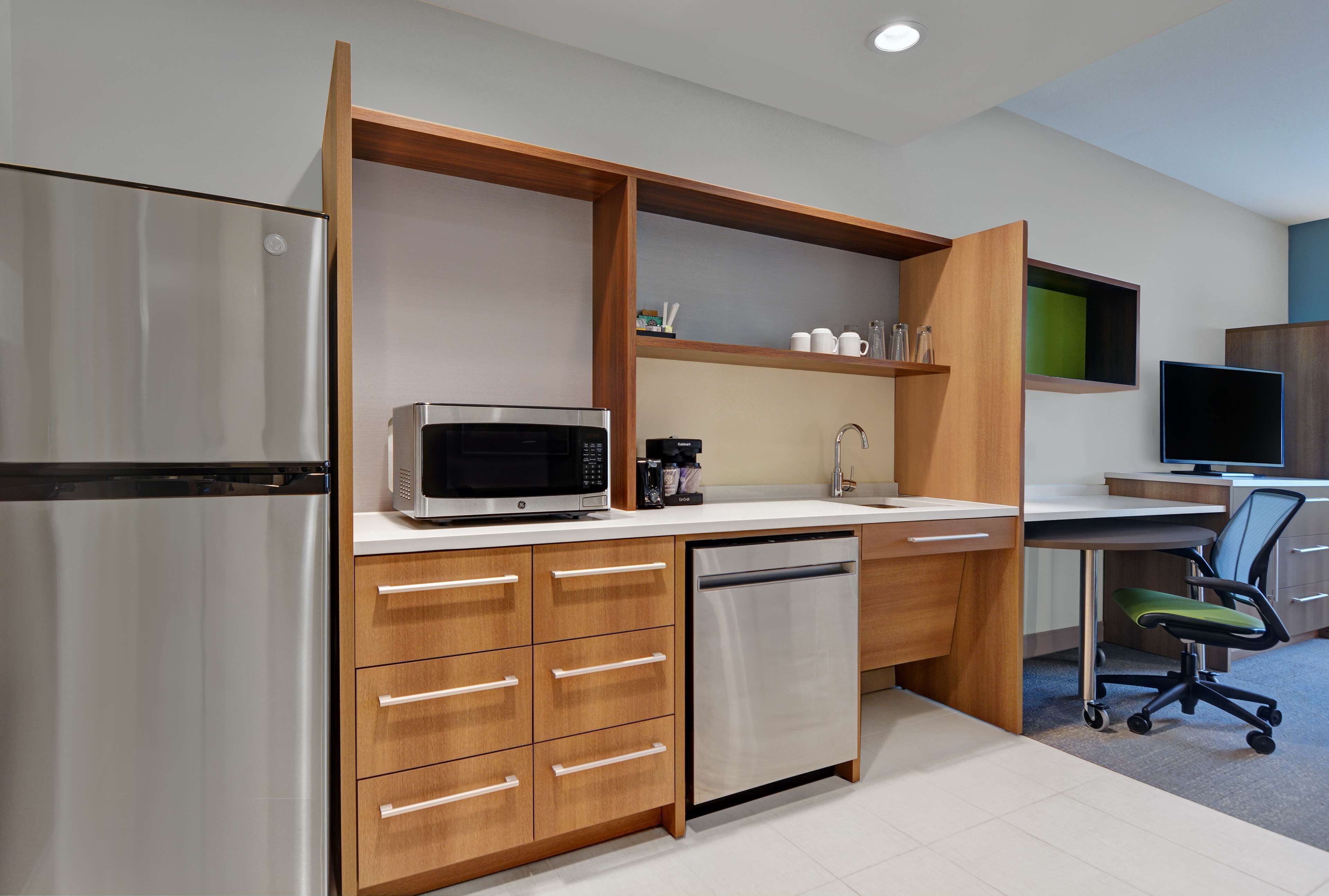 full-sized fridge, microwave, dishwasher, coffee/tea maker