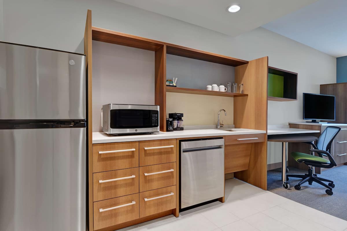 full-sized fridge, microwave, dishwasher, coffee/tea maker