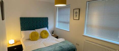 4 bedrooms, desk, iron/ironing board, travel cot
