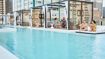 Seasonal outdoor pool, cabanas (surcharge), pool umbrellas