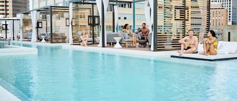 Seasonal outdoor pool, cabanas (surcharge), pool umbrellas