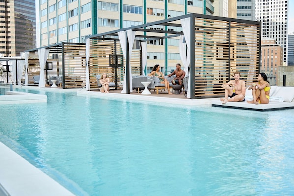 Seasonal outdoor pool, cabanas (surcharge), pool umbrellas