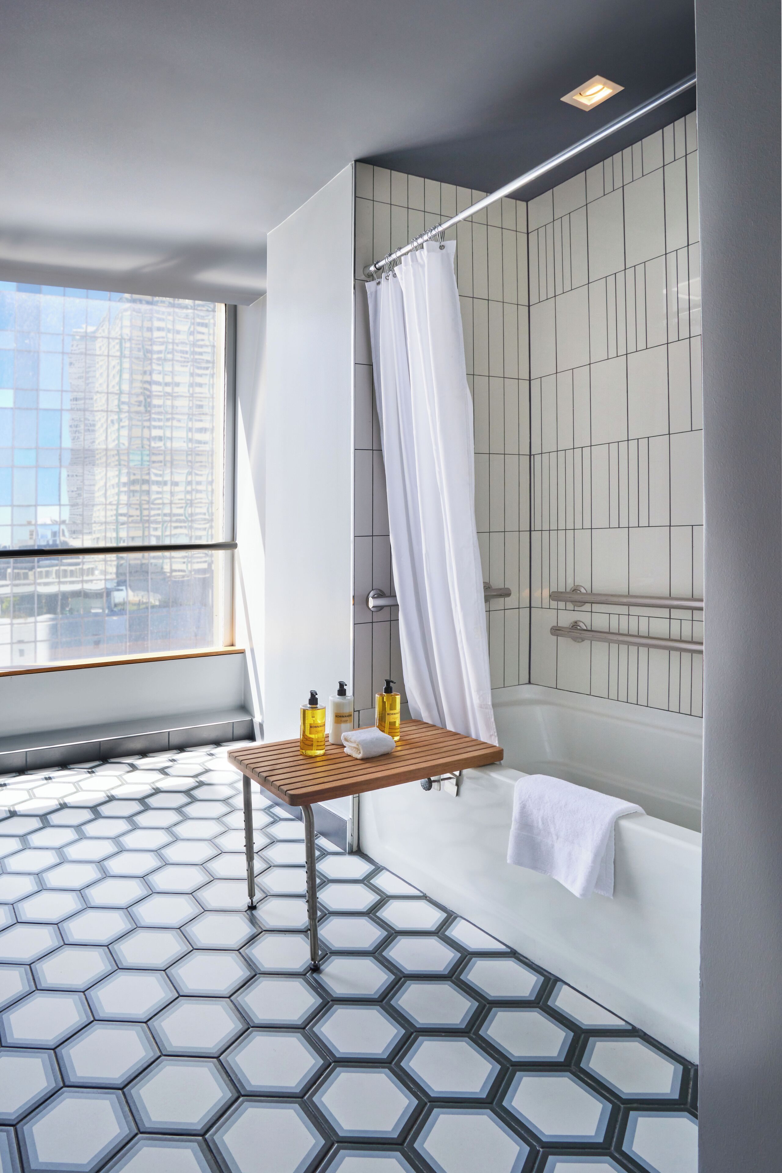 suite (skyline) | bathroom | designer toiletries, hair dryer, bathrobes, slippers