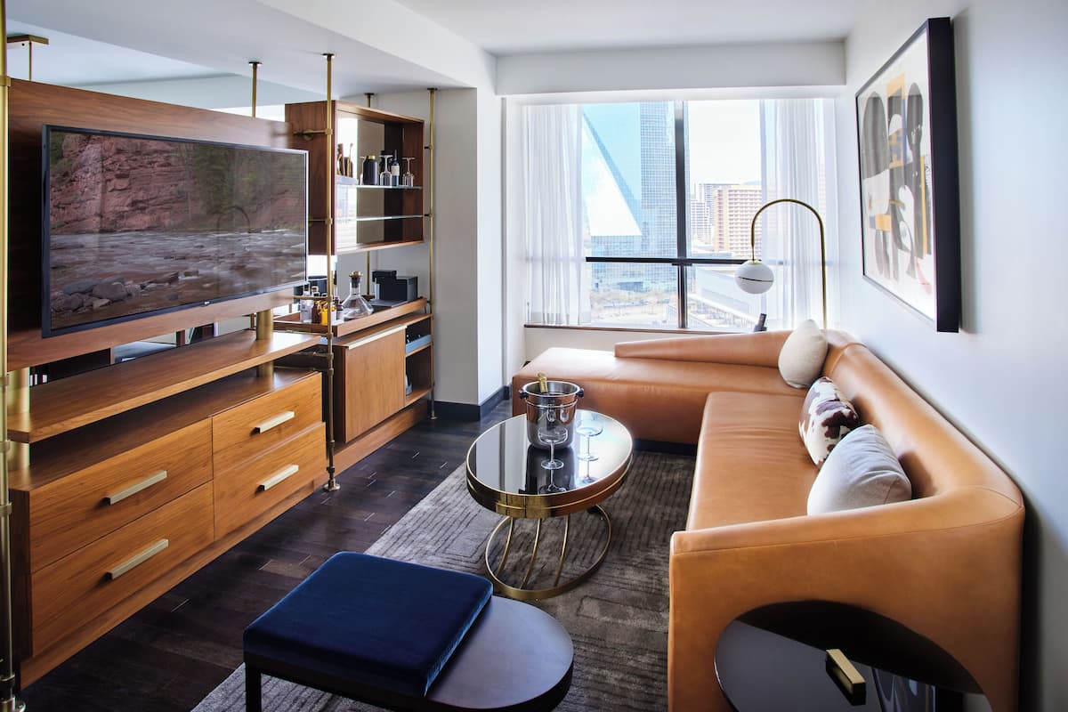 Suite (NATIONAL) | Living area | 55-inch flat-screen TV with cable channels, TV, Netflix