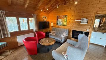 Cabaña | Área de sala de estar | Televisión