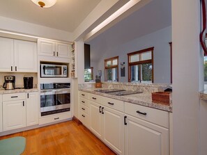 Fridge, microwave, oven, stovetop - Tropical Key West Home w/ Heated Pool (Jensen Beach)