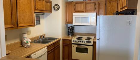 Condo, Multiple Beds (Sugar Ski & Country Club Unit 225 Sil) | Private kitchen | Fridge, microwave, stovetop, dishwasher