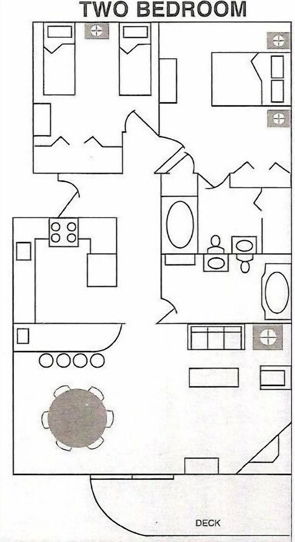 A two-bedroom floor plan with a kitchen, dining area, and a deck.