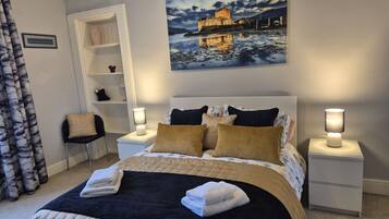 2 dormitorios, tabla de planchar con plancha, wifi gratis y ropa de cama