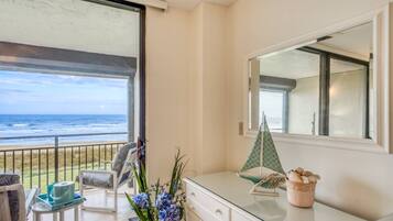 Condo, 3 Bedrooms (Sand Dollar #205) | Living room | TV, books