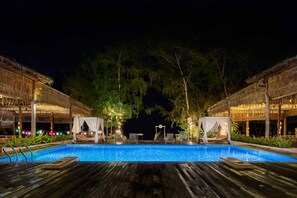 Outdoor pool, pool umbrellas, pool loungers - Eden Beach Resort by EHM (Koh Rong Sanloem)