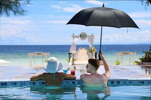 Outdoor pool, pool umbrellas, sun loungers