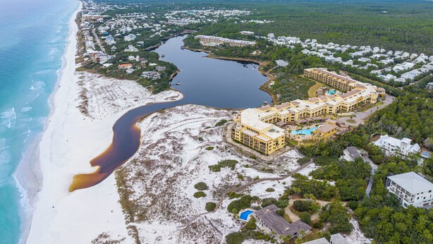 An aerial view of a coastal resort with a large hotel, a beach, and a river. - 4 BR Grayton Beach, private beach, Tesla charger, 2 pools, tennis, & Pickle ball (Santa Rosa Beach)