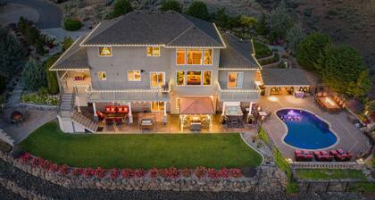 Beautiful estate with a breathtaking view, pool, hot tub, theater room & more!