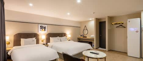 VIP Twin | Premium bedding, individually decorated, desk, laptop workspace