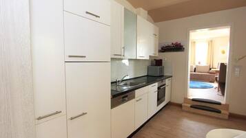 Apartment, Hot Tub, Garden Area | Private kitchen | Fridge, microwave, oven, dishwasher