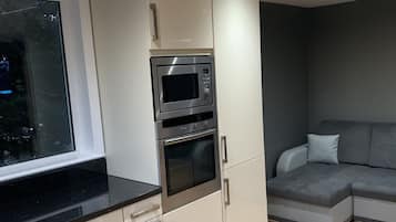 Apartment, Multiple Beds | Private kitchen