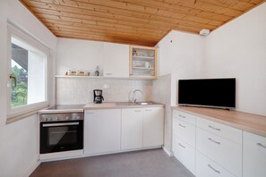 Frigorifero, forno, piano cottura, macchina per tè/caffè