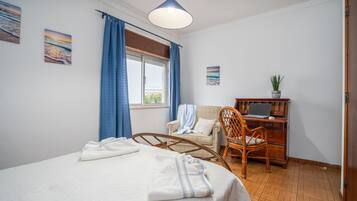 2 dormitorios, tabla de planchar con plancha, wifi gratis y ropa de cama