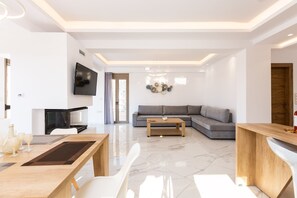 Smart TV, fireplace, video-game console, foosball