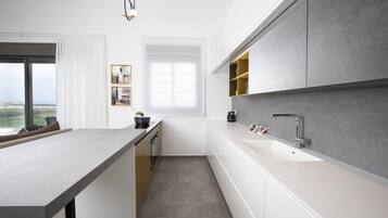 Apartment, 3 Bedrooms | Private kitchen | Fridge, microwave, oven, stovetop
