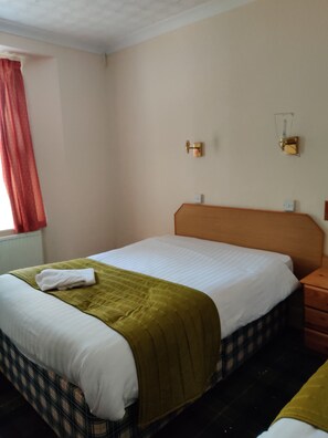 Desk, iron/ironing board, free cribs/infant beds, bed sheets