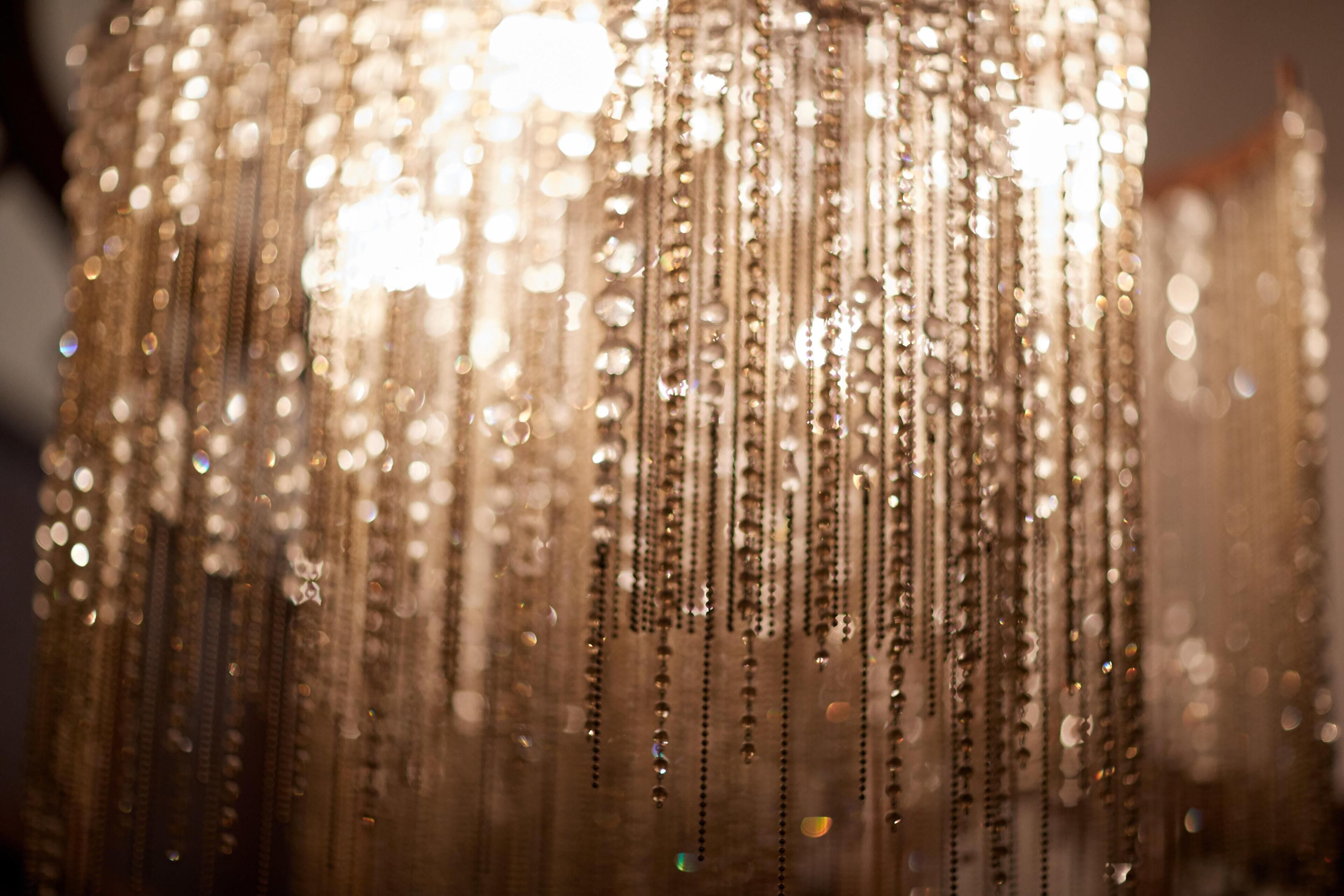 A chandelier with multiple strands of hanging beads.