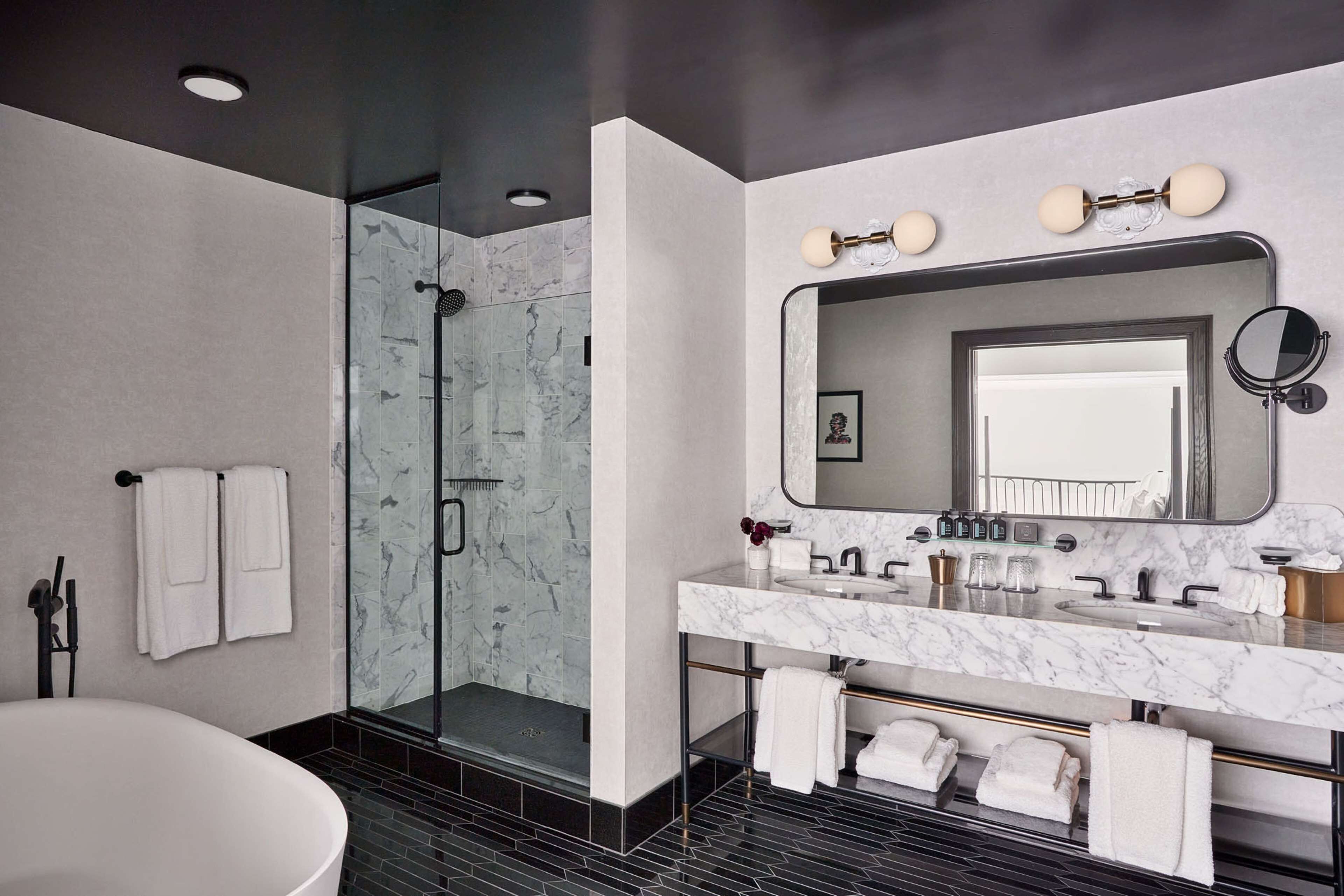 suite, 1 king bed (loft) | bathroom | rainfall showerhead, designer toiletries, hair dryer, bathrobes