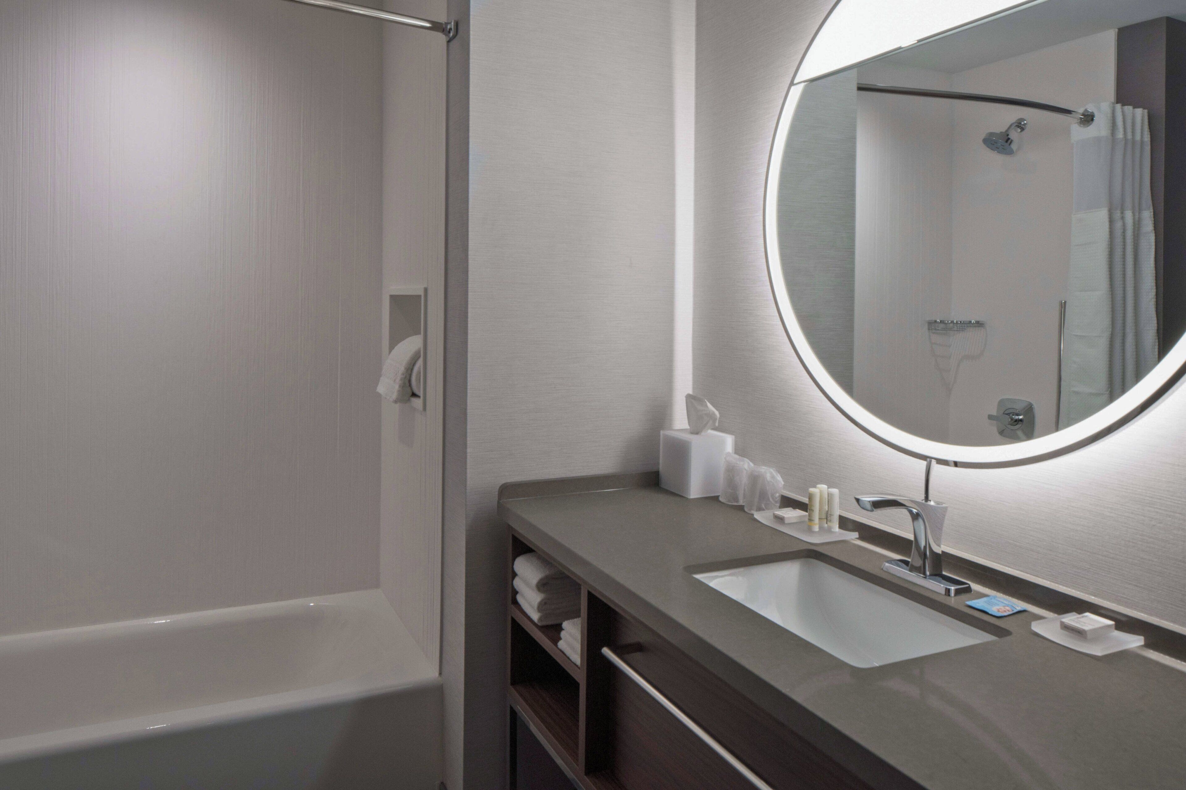 combined shower/bathtub, hair dryer, towels, soap